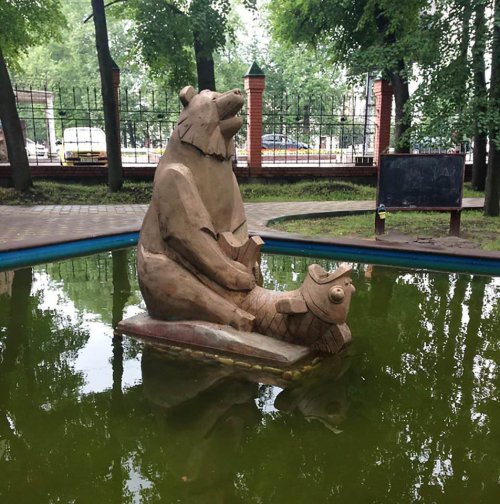 Bear fish statue